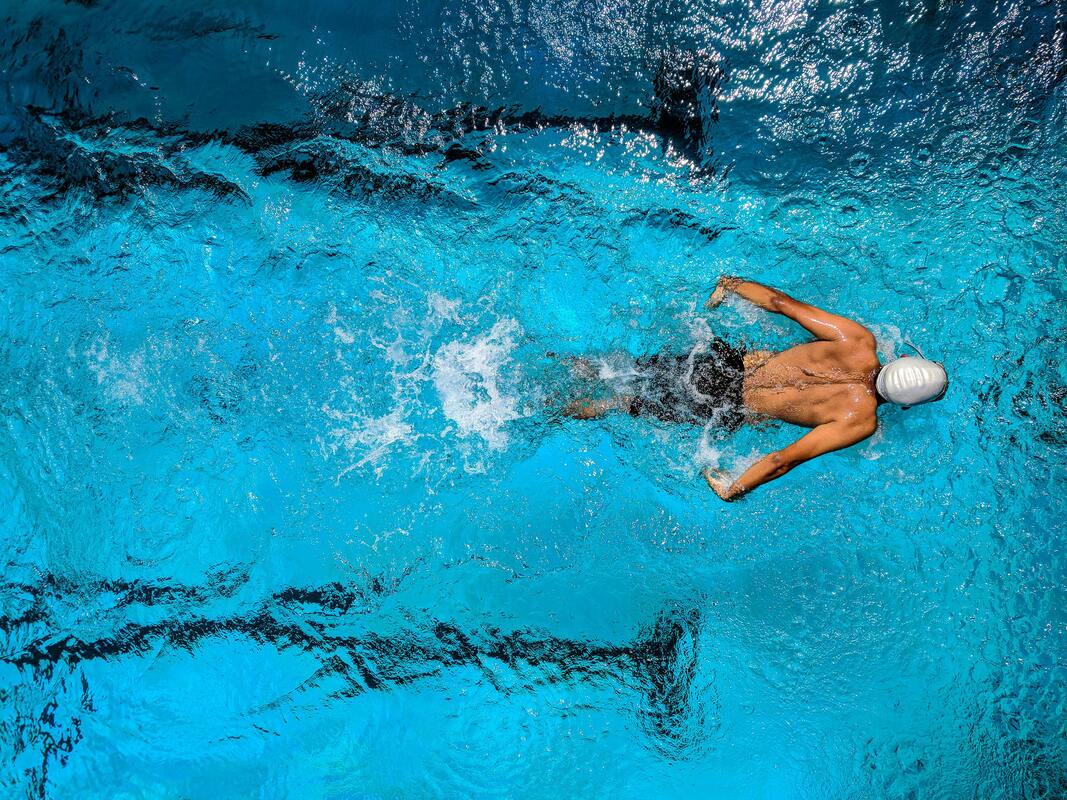 Swimming person stock photo